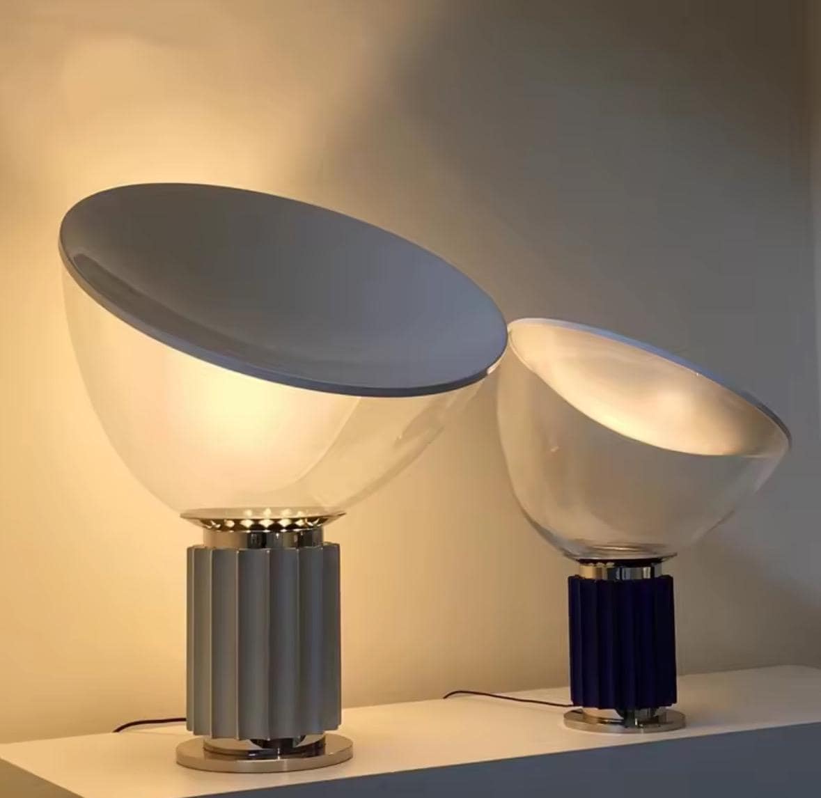 Italian designer table lamp creating ambient lighting in modern living room