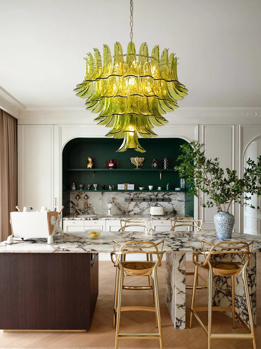 Green Murano chandelier with cascading glass tiers in elegant dining room
