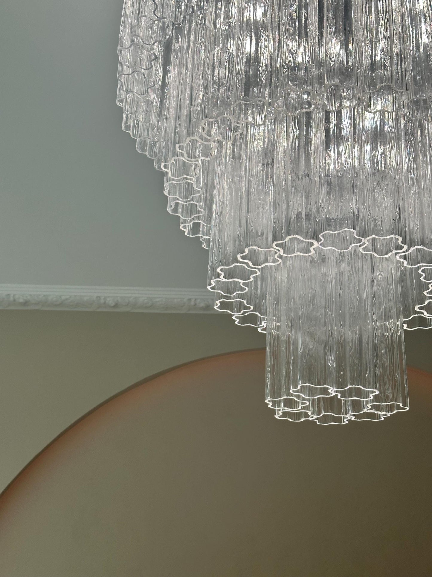 Modern ceiling light with Murano glass elements creating ambient lighting