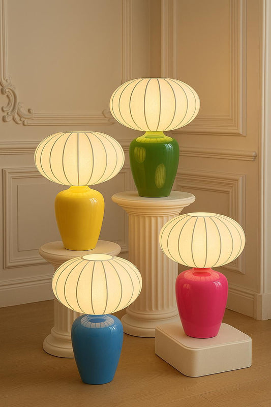 French ceramic designer table lamp with glossy green base in elegant bedroom