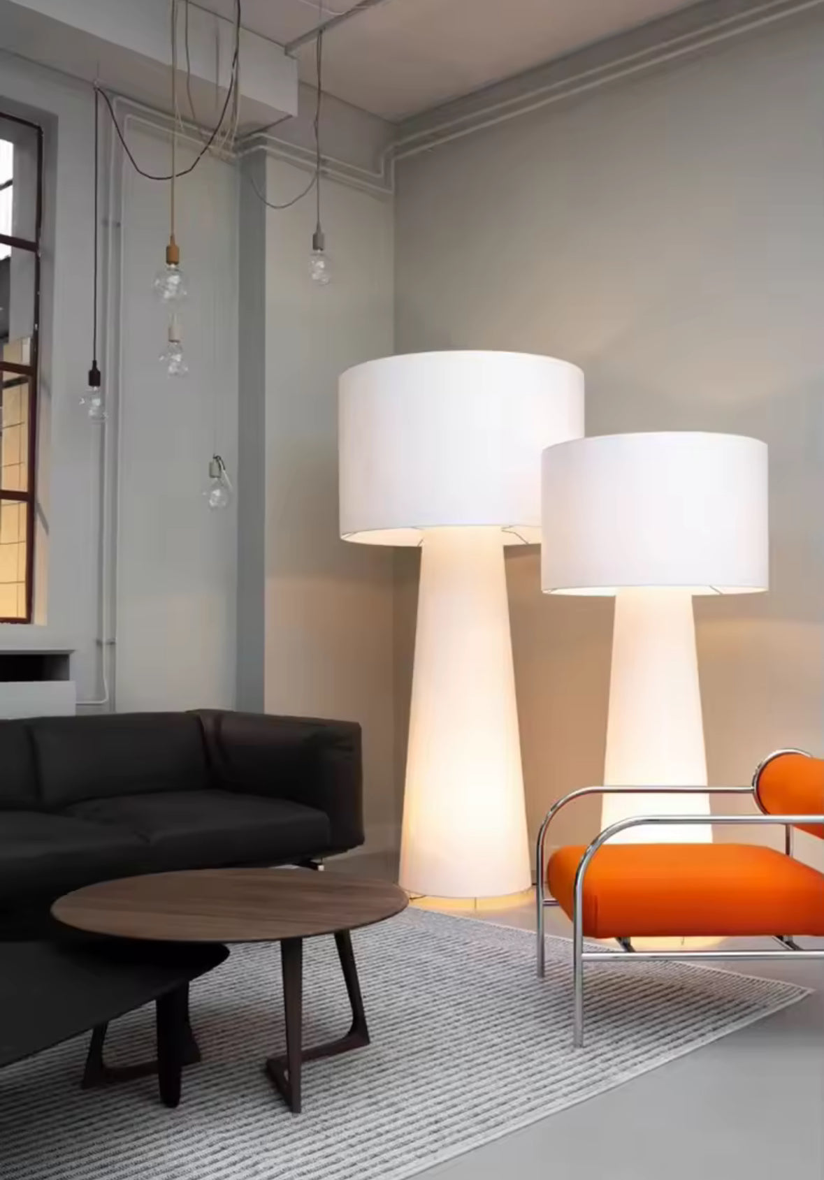 Minimalist floor lamp in contemporary living room with clean lines