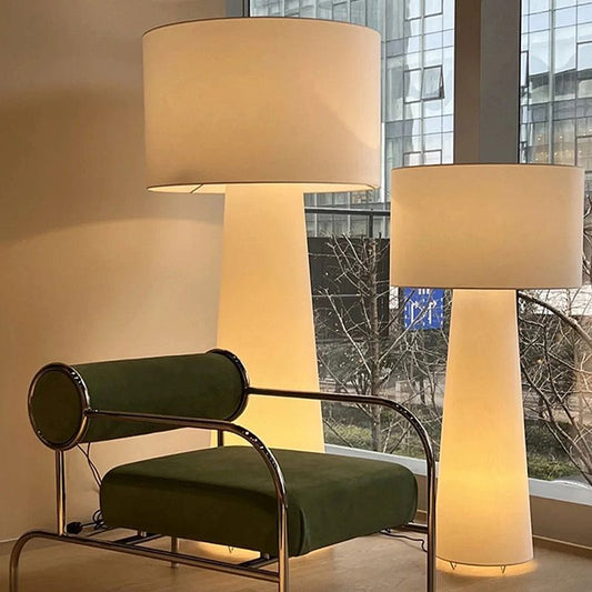 Wabi Sabi modern floor lamp with cream fabric shade in minimalist room