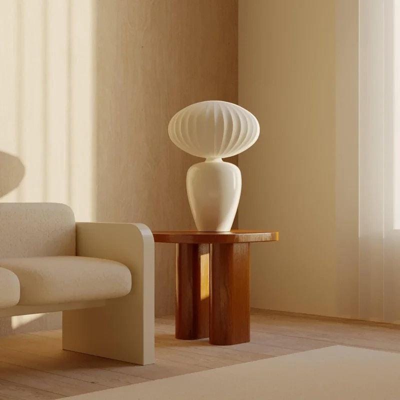 Modern ceramic table lamp creating ambient lighting in Scandinavian living room
