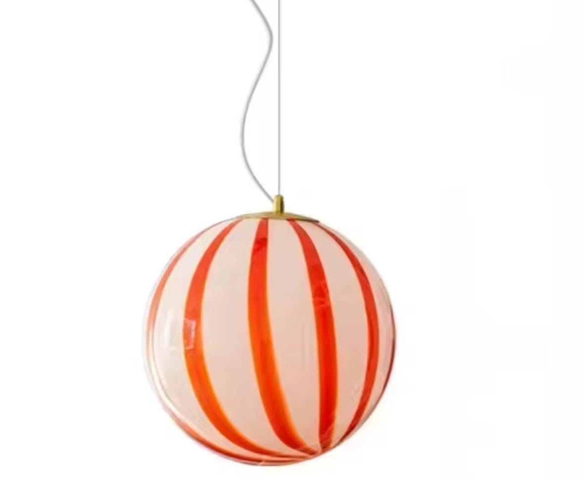 Handcrafted venetian glass lamp showing striped globe pattern detail