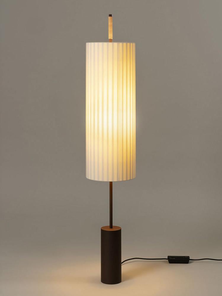 Japanese inspired designer floor lamp with dark brown metal base