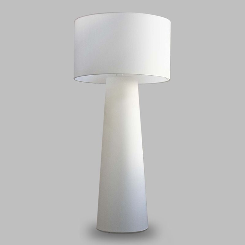 Modern floor lamp with handcrafted fabric shade creating warm ambient light