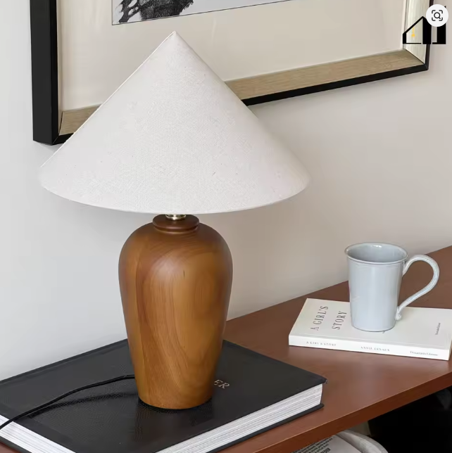 Handcrafted walnut desk lamp showing organic wood texture minimalist style