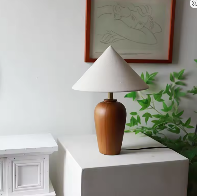 Mid century table lamp in walnut wood showcasing Scandinavian interior design