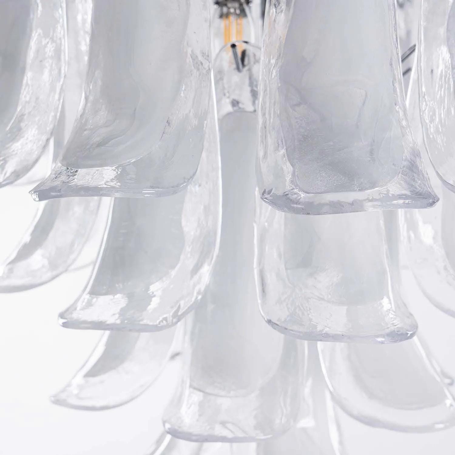 Artisan murano chandelier adding elegance to minimalist interior