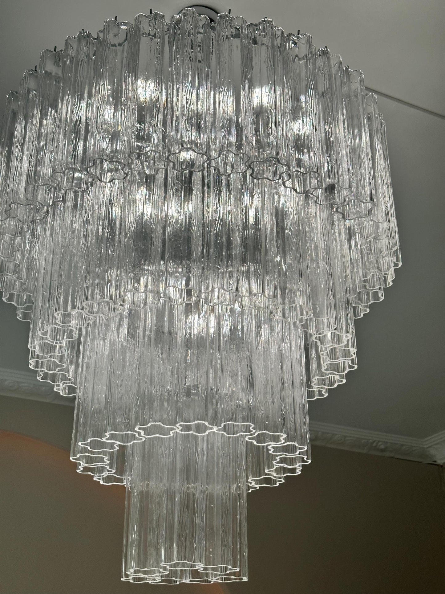 Murano glass chandelier with hand-blown prisms in elegant dining room