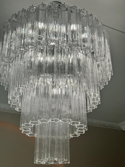 Murano glass chandelier with hand-blown prisms in elegant dining room