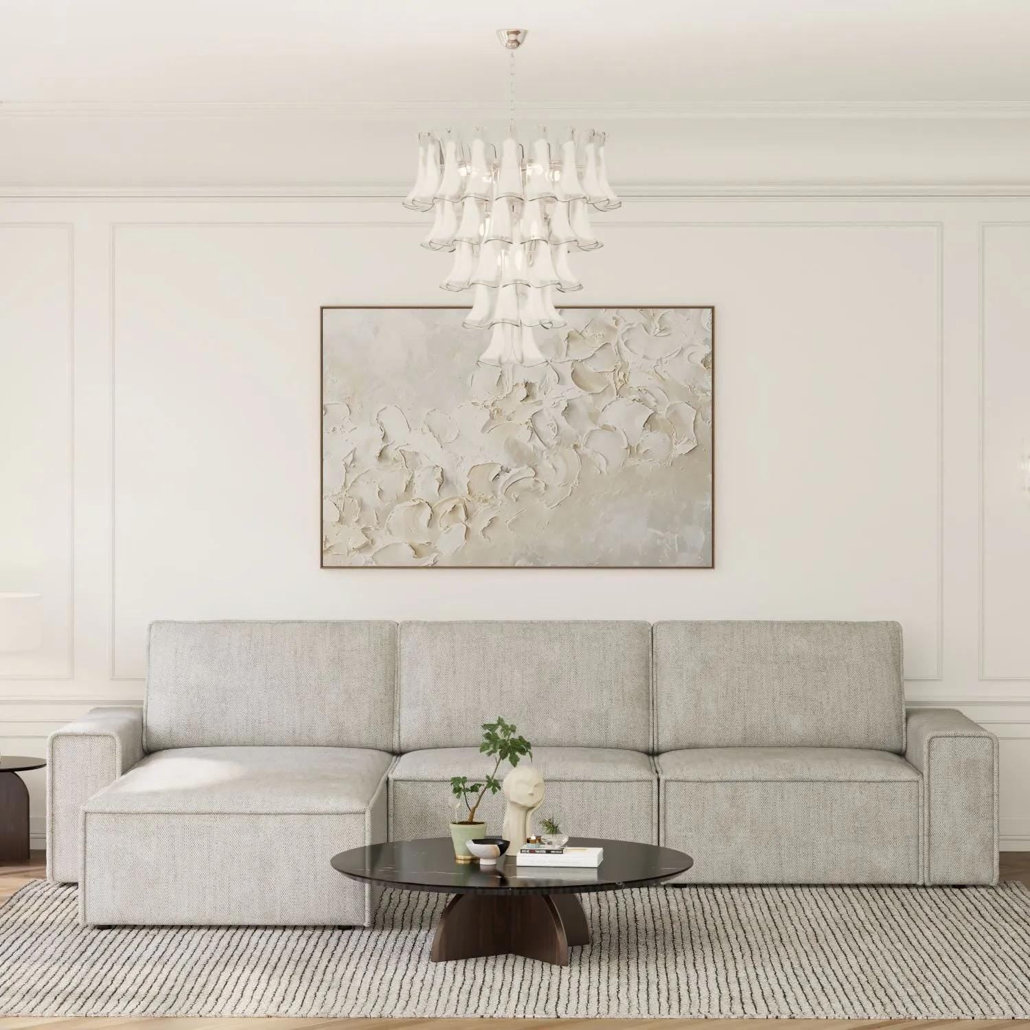 Handcrafted murano chandelier suspended over modern dining table