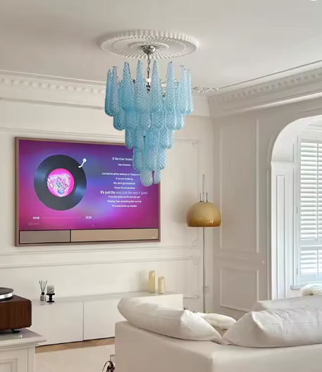 Elegant blue venetian glass lamp illuminating scandinavian dining room