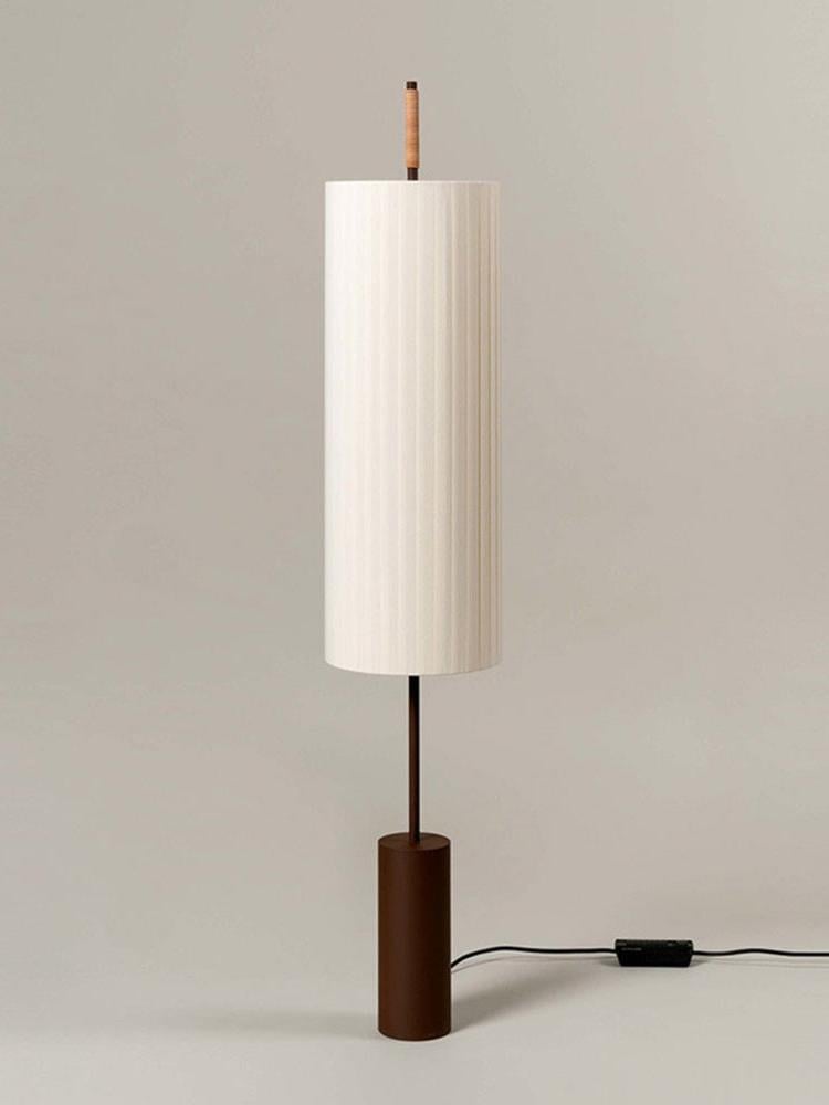 Wabi sabi modern floor lamp with fabric shade in minimalist living room