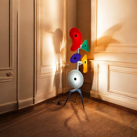 Orbital modern floor lamp with sculptural glass panels in contemporary living room